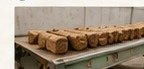 Cooling formed biomass briquettes